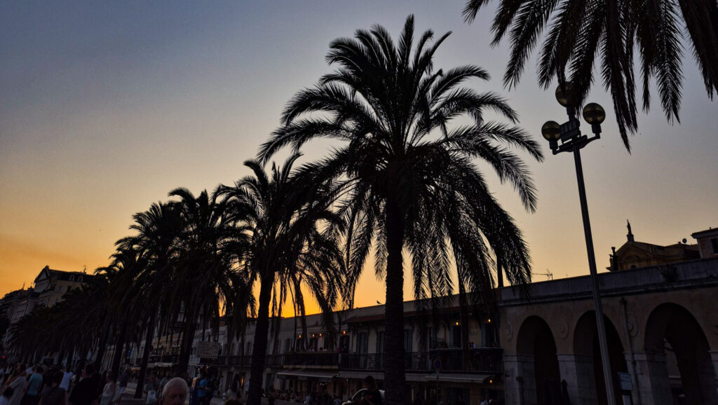 Nice Promenade at sunset, with a view of the palm trees